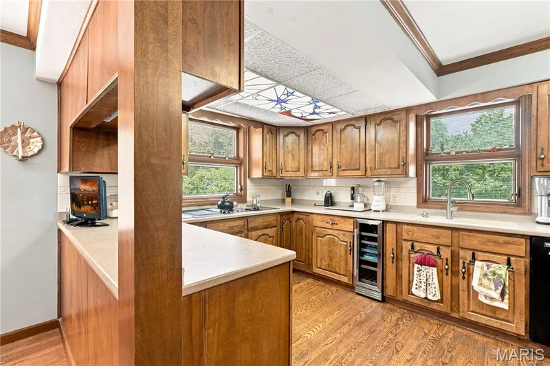 The Kitchen features a Jenn-Air range and built-in wine cooler — 505 Richley Drive, Chesterfield, MO 63017