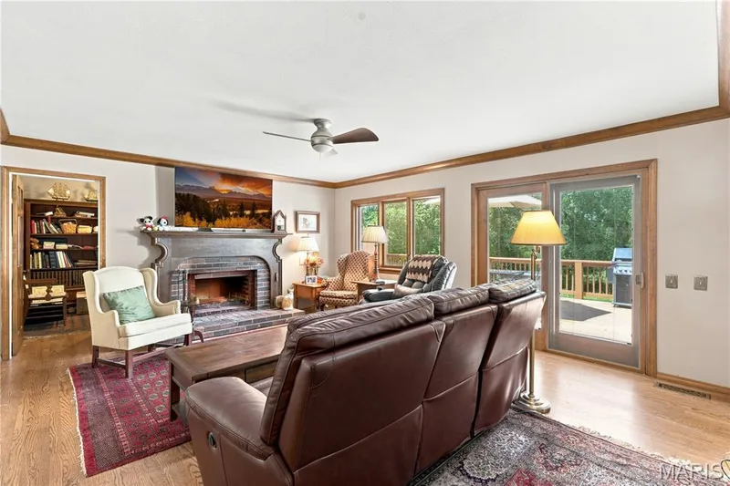 The Pella sliding glass door leads to the private deck — 505 Richley Drive, Chesterfield, MO 63017