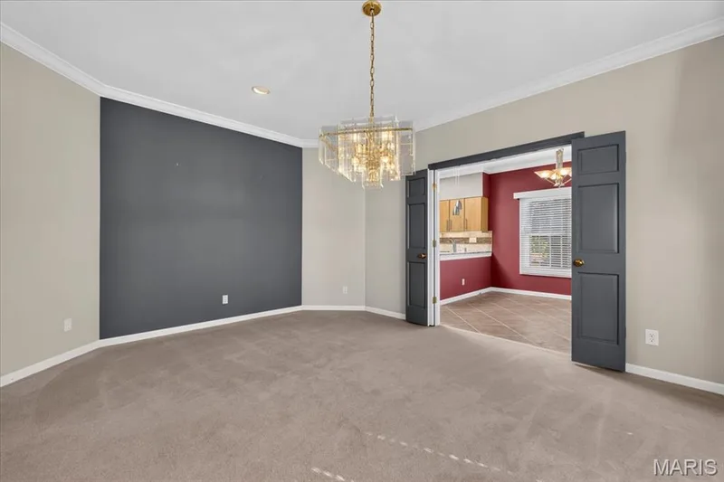 Another view of the dining room with doors to the breakfast room. — 14620 Timberlake Manor Court, Chesterfield, MO 63017