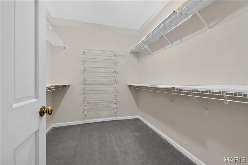 Large primary bedroom walk in closet. — 14620 Timberlake Manor Court, Chesterfield, MO 63017