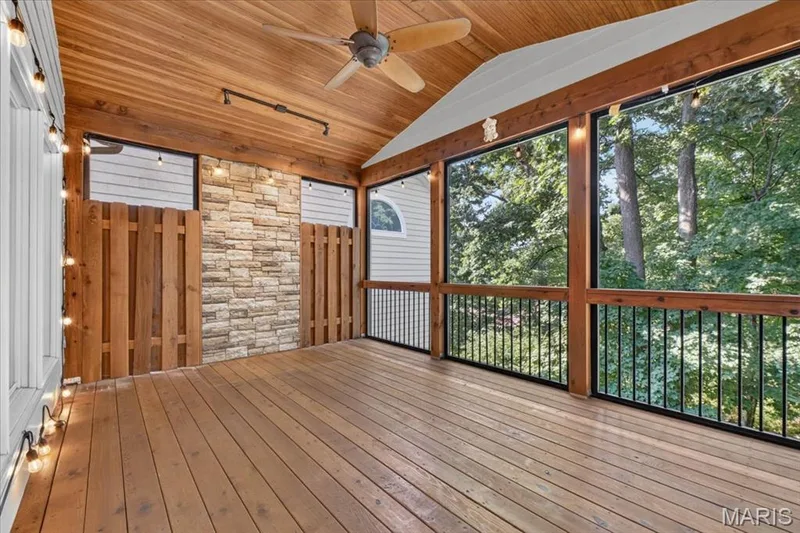 The upper-level screened porch with beautiful view of your private backyard. — 14620 Timberlake Manor Court, Chesterfield, MO 63017