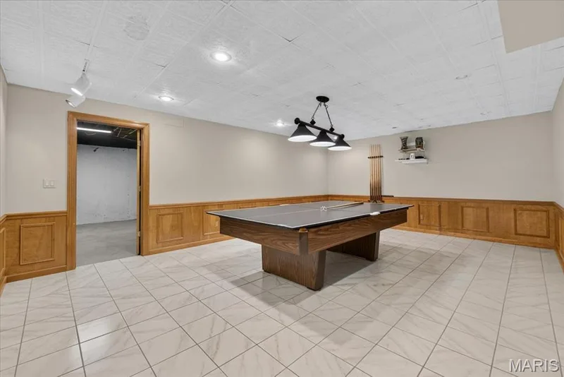 A great game room or hobby center in the lower level. — 14620 Timberlake Manor Court, Chesterfield, MO 63017