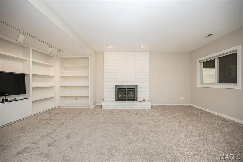Freshly painted lower-level family room with new carpeting. — 14620 Timberlake Manor Court, Chesterfield, MO 63017