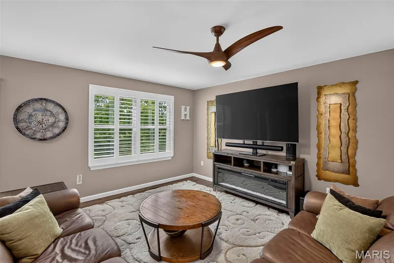 Great Room with Large Window Overlooking the Tree Lined Back Yard — 2322 Wills Hollow Drive, St Peters, MO 63376