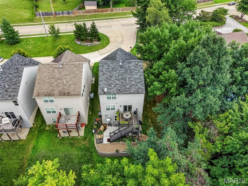 Aerial View of the Home Surrounded by Trees — 2322 Wills Hollow Drive, St Peters, MO 63376
