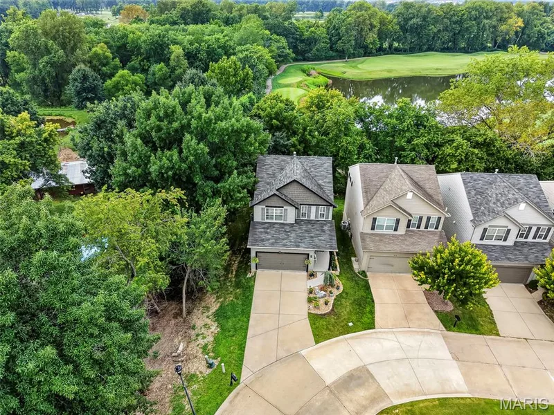 Aerial View of the Home on a Tree Lined Lot Backing to  Golf Course — 2322 Wills Hollow Drive, St Peters, MO 63376