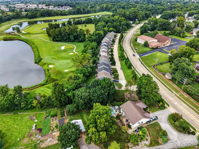 Aerial View of the Home on a Tree Lined Lot Backing to Golf Course — 2322 Wills Hollow Drive, St Peters, MO 63376