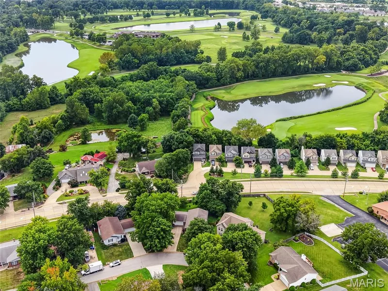 Aerial View of the Home on a Tree Lined Lot Backing to Golf Course — 2322 Wills Hollow Drive, St Peters, MO 63376