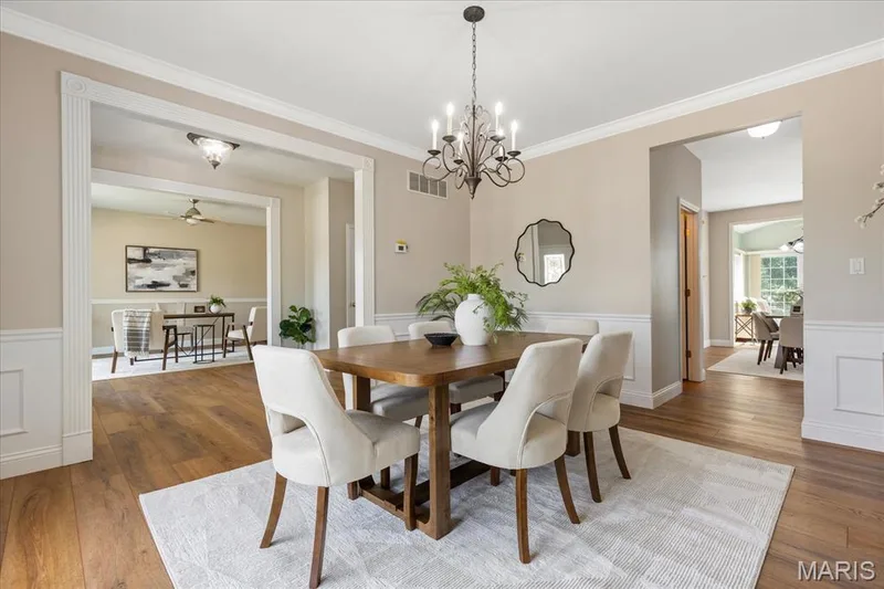 Another view of the dining room to show the seamless flow into the different spaces. — 354 Buckington Street, St Peters, MO 63376