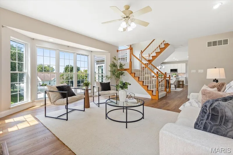 Everyday living flows effortlessly here, connecting relaxing lounge spaces to the heart of the home. — 354 Buckington Street, St Peters, MO 63376