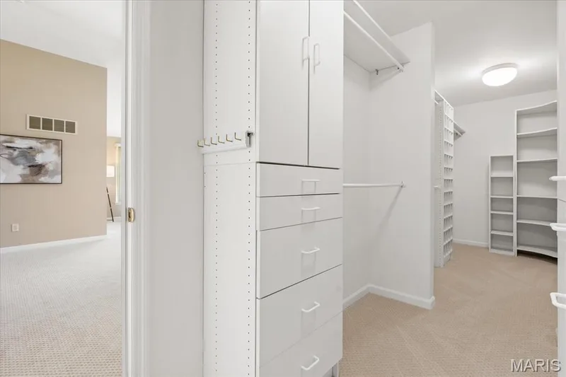 Everything has its place in this smartly designed closet system, keeping your clothing and accessories perfectly arranged. — 354 Buckington Street, St Peters, MO 63376