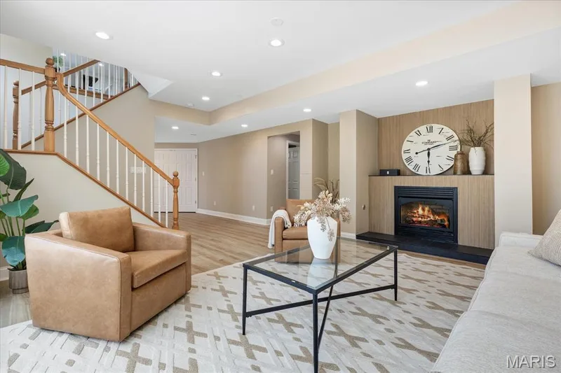 With wide-open spaces and modern luxury vinyl plank flooring, this lower level effortlessly adapts to your lifestyle. — 354 Buckington Street, St Peters, MO 63376