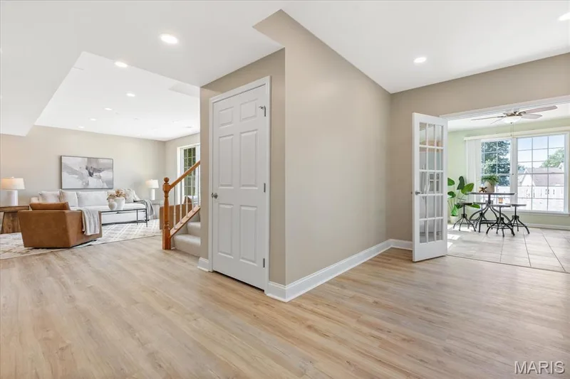 Designed for ultimate entertainment flexibility, French doors open wide to connect the family room directly to your lower-level kitchen area. — 354 Buckington Street, St Peters, MO 63376