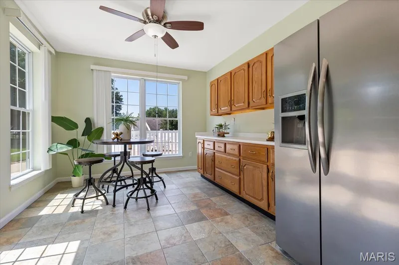 Host pool parties and game days with ease thanks to a fully equipped second kitchen area complete with full-size appliances and dining space. — 354 Buckington Street, St Peters, MO 63376
