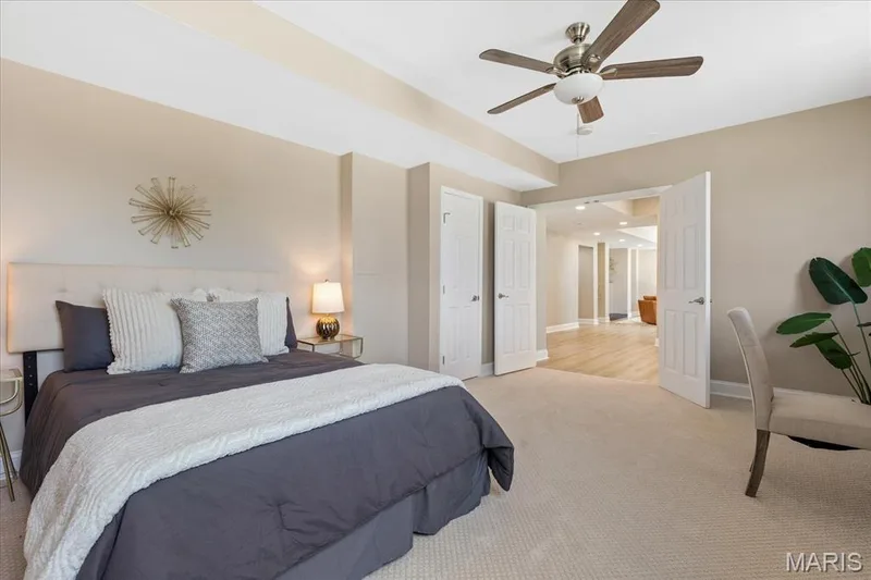 Generous size and peaceful neutral tones make this lower-level guest room a welcoming home-away-from-home. — 354 Buckington Street, St Peters, MO 63376