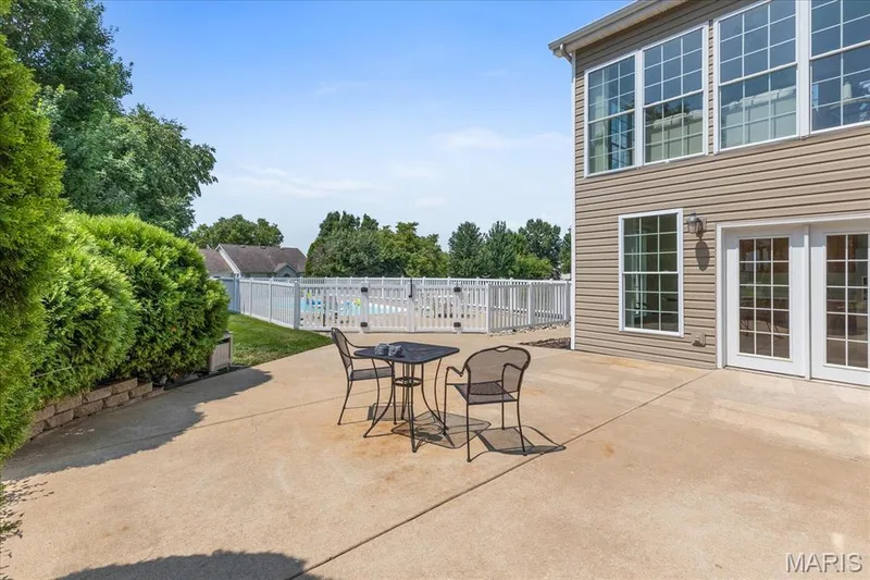 Unwind with morning coffee or evening drinks in a secluded outdoor setting right off the basement entertaining space. — 354 Buckington Street, St Peters, MO 63376
