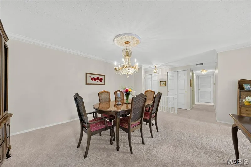 Dining Room with Chandelier — 1530 Bedford Forge Court #15, Chesterfield, MO 63017