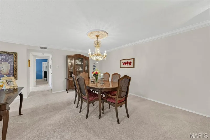 Dining Room with Chandelier — 1530 Bedford Forge Court #15, Chesterfield, MO 63017