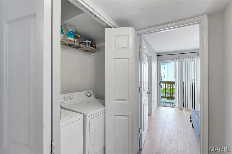 Dedicated laundry closet with wire shelving — 640 Homerun Drive #37N, O'Fallon, MO 63366