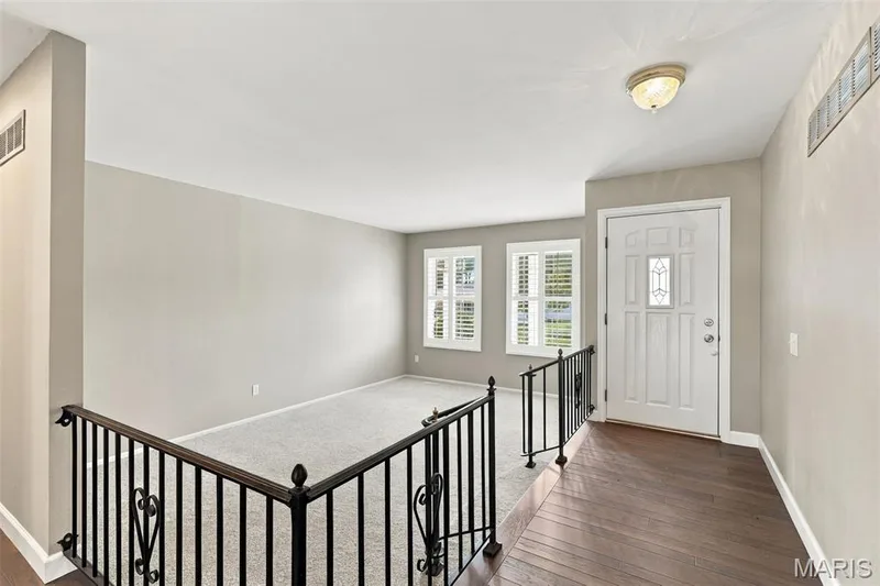 Warm Hickory hardwood floors lead  you through the home — 1230 Luray Drive, Chesterfield, MO 63017