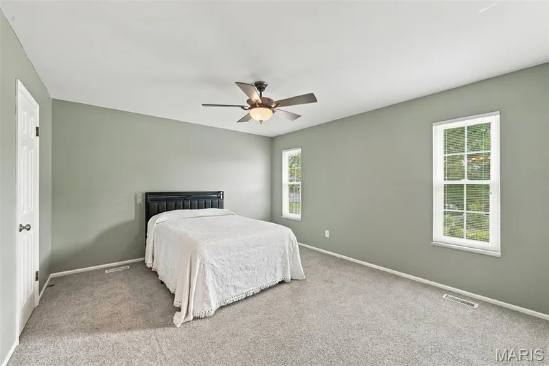 You'll love relaxing in the large primary bedroom at the end of the day. — 1230 Luray Drive, Chesterfield, MO 63017