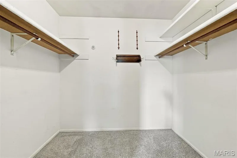 Large walk in closet in the primary bedroom — 1230 Luray Drive, Chesterfield, MO 63017