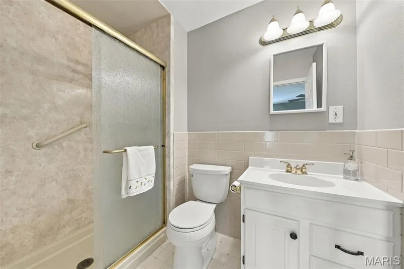 Primary bath features a walk in shower — 1230 Luray Drive, Chesterfield, MO 63017