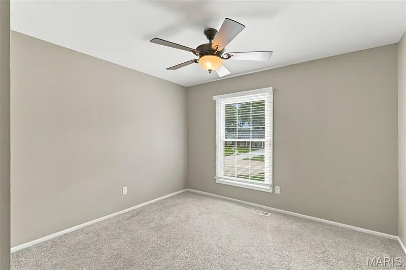 3rd bedroom features newer carpeting and ceiling fan — 1230 Luray Drive, Chesterfield, MO 63017