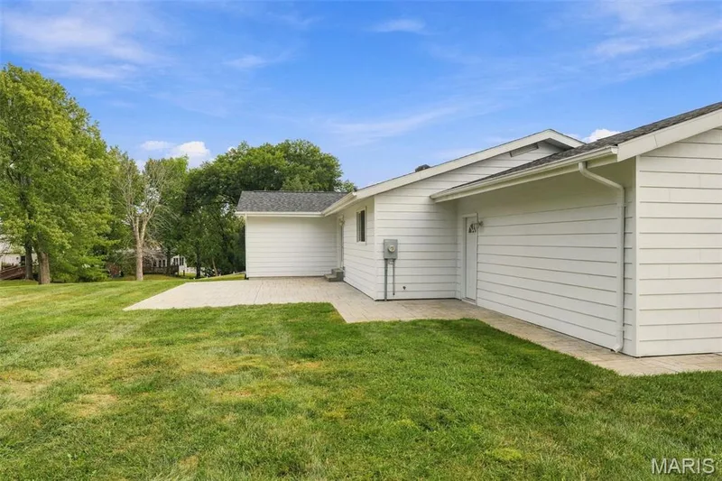 Note the walk way around the home leading to the patio — 1230 Luray Drive, Chesterfield, MO 63017