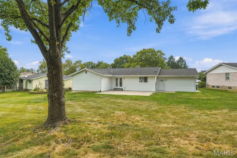 Think about sitting outside on a gorgeous day, drinking a cold beverage and watching the world go by — 1230 Luray Drive, Chesterfield, MO 63017
