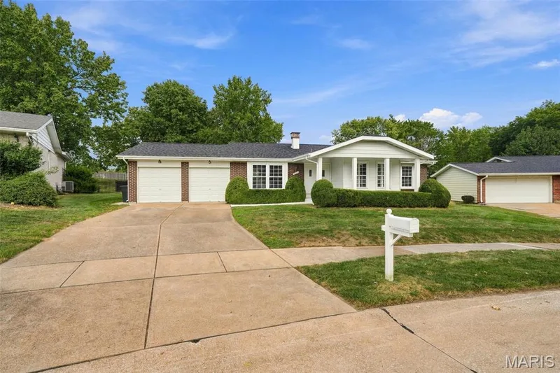 4 cars easily fit on the driveway, with 2 more in the garage when friends come to visit. — 1230 Luray Drive, Chesterfield, MO 63017