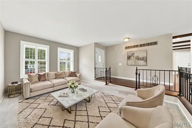 Virtually staged picture of the living room — 1230 Luray Drive, Chesterfield, MO 63017