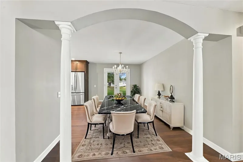Virtually staged picture of the dining room — 1230 Luray Drive, Chesterfield, MO 63017