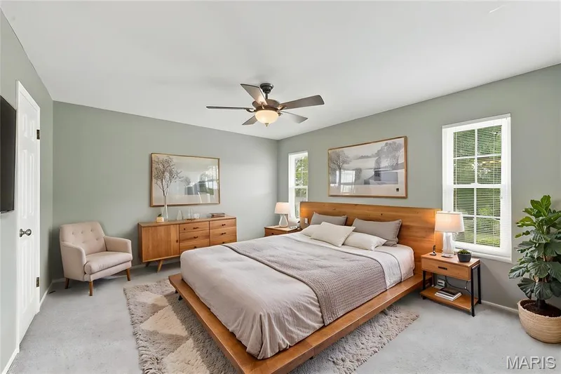 Virtually staged picture of the primary bedroom — 1230 Luray Drive, Chesterfield, MO 63017