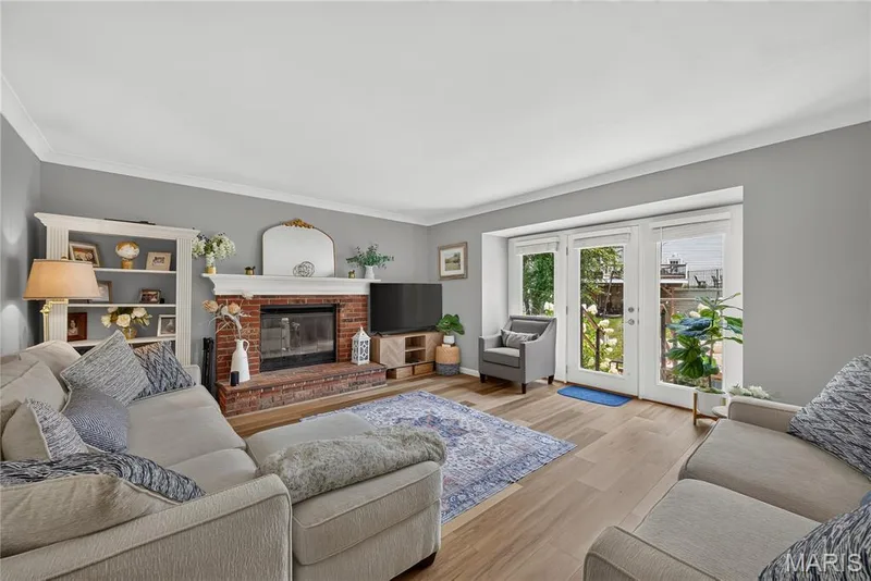 Family Room with Wood-burning Fireplace — 47 Park Place, St Peters, MO 63376