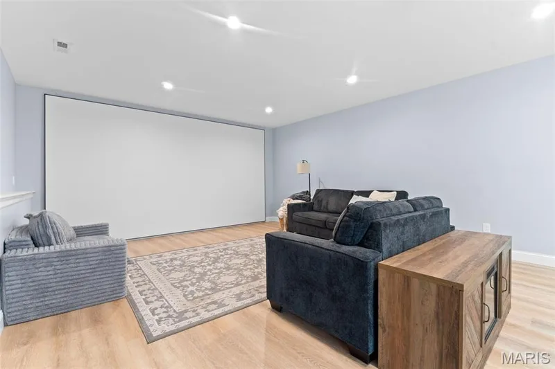Media/theater area ~ screen and projector stay — 14 Prairie Lake Court, Wentzville, MO 63385