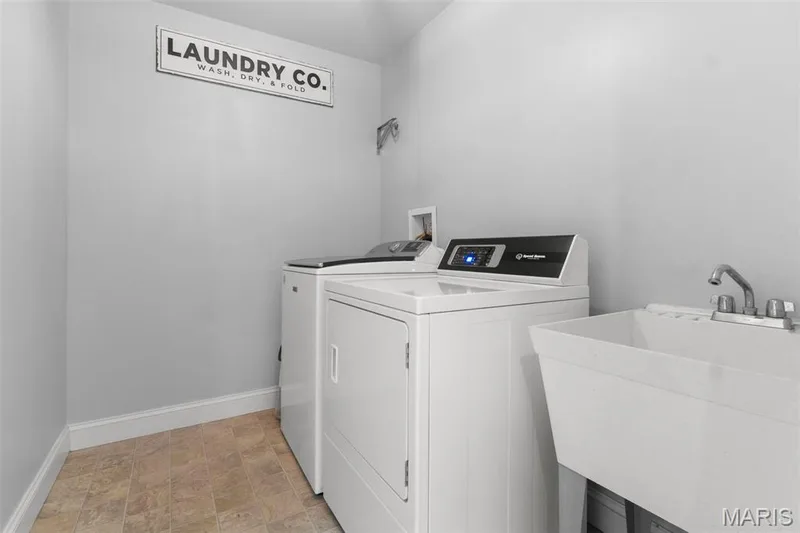 Main floor laundry w/ sink — 14 Prairie Lake Court, Wentzville, MO 63385