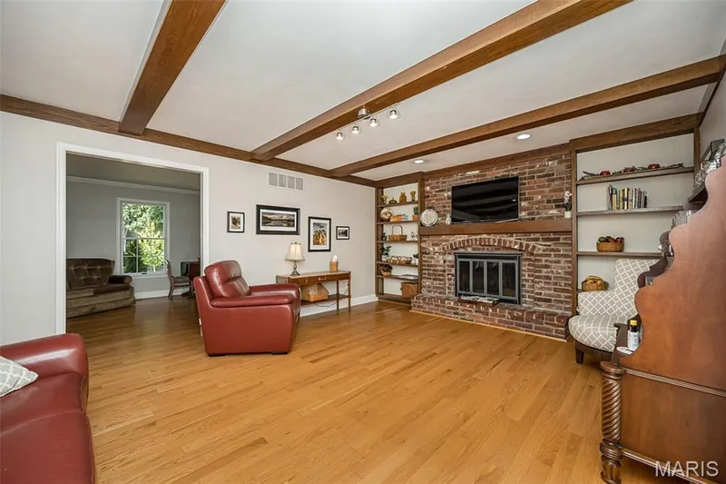 Cozy family room with built in bookcases — 14246 Cypress Hill Drive, Chesterfield, MO 63017