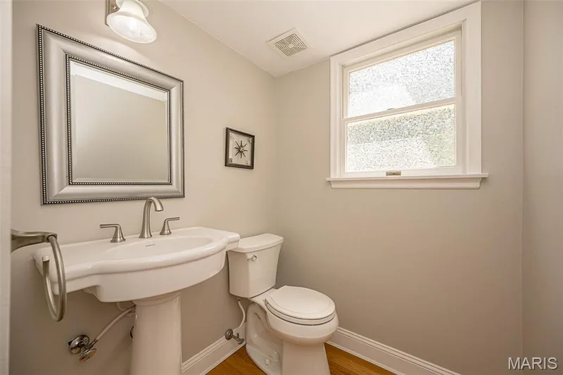 Updated half bathroom, main level — 14246 Cypress Hill Drive, Chesterfield, MO 63017
