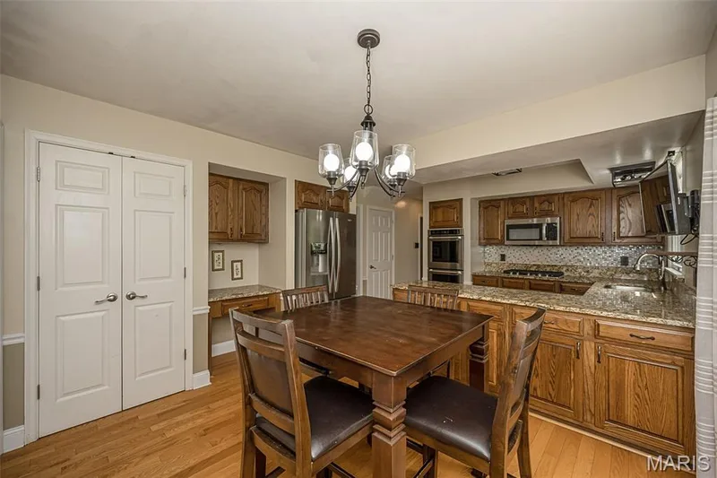 Kitchen and breakfast area incuding a pantry — 14246 Cypress Hill Drive, Chesterfield, MO 63017