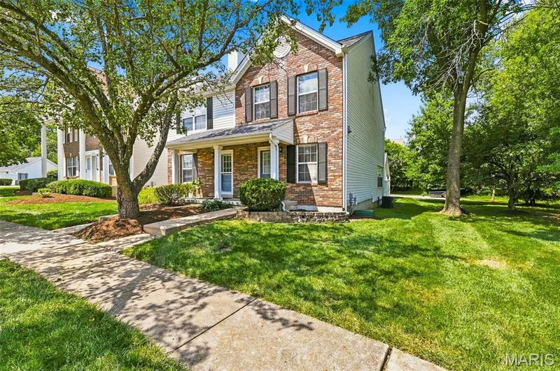 Brick and siding exterior with a covered front porch — 16561 Carriage View Court, Wildwood, MO 63040