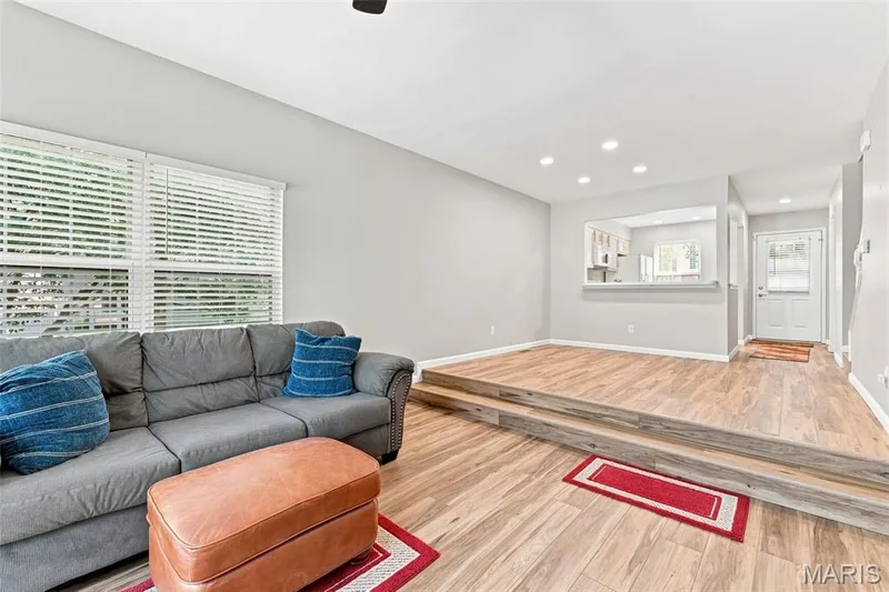 Wood-finish flooring throughout, featuring a multi-level design — 16561 Carriage View Court, Wildwood, MO 63040