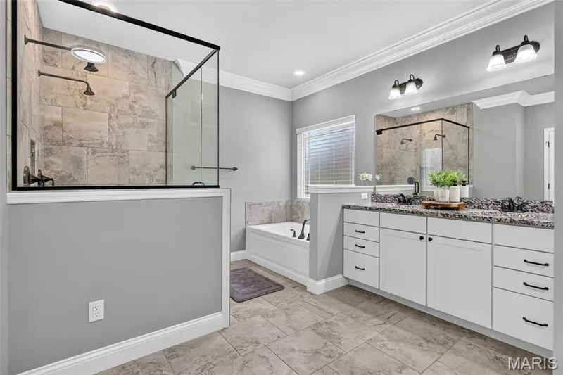 Luxurious primary en-suite! Double shower heads, separate soaking tub & dual vanities! — 826 Liberty Creek Drive, Wentzville, MO 63385