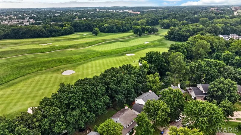 Expansive golf course landscaping with mature tree lines — 2947 Bromley Drive, O'Fallon, MO 63368