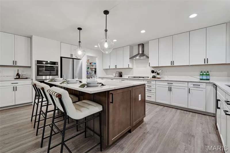Well-lit with brilliant pendant and recessed lighting — 310 Osprey Court, Lake St. Louis, MO 63367