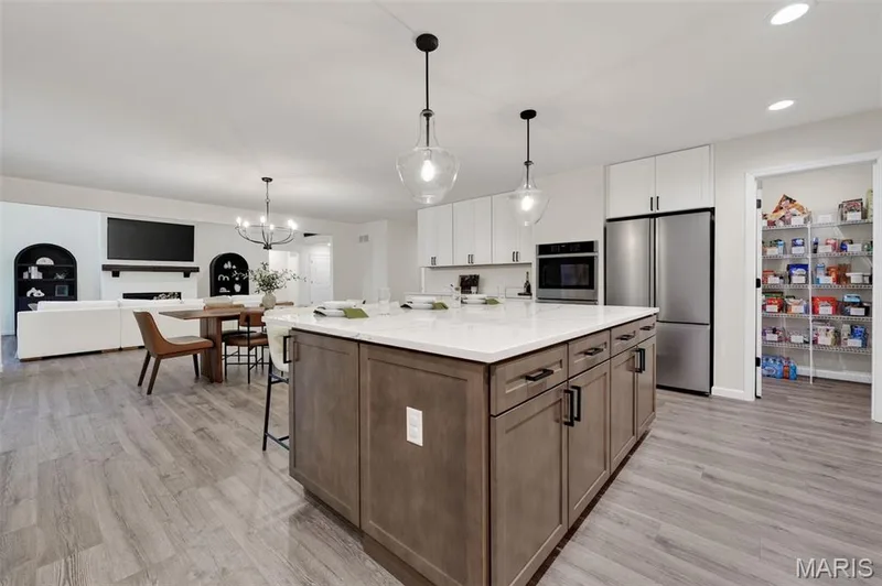 Large walk in pantry and sunken fridge cutout and double wall ovens — 310 Osprey Court, Lake St. Louis, MO 63367