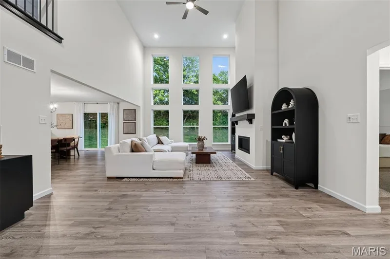 Soaring 2 story great room off the 2 story foyer entry — 310 Osprey Court, Lake St. Louis, MO 63367