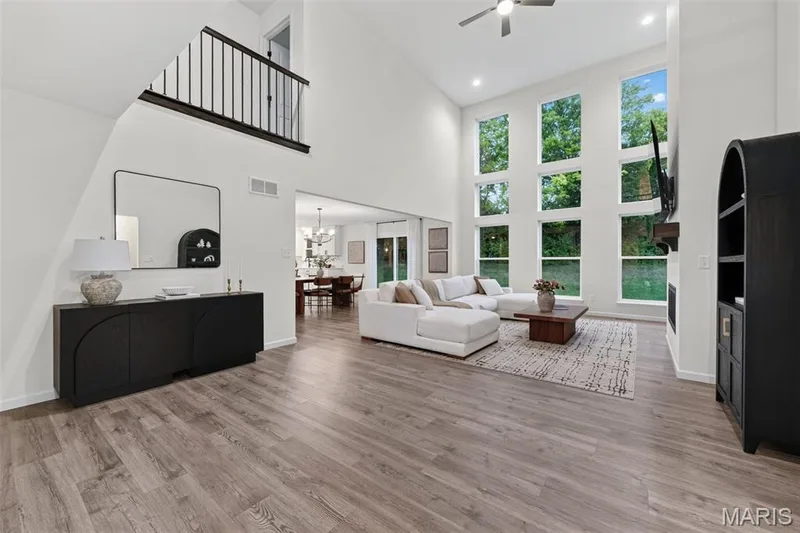Dramatic wall of multi-pane windows extends all the way up — 310 Osprey Court, Lake St. Louis, MO 63367