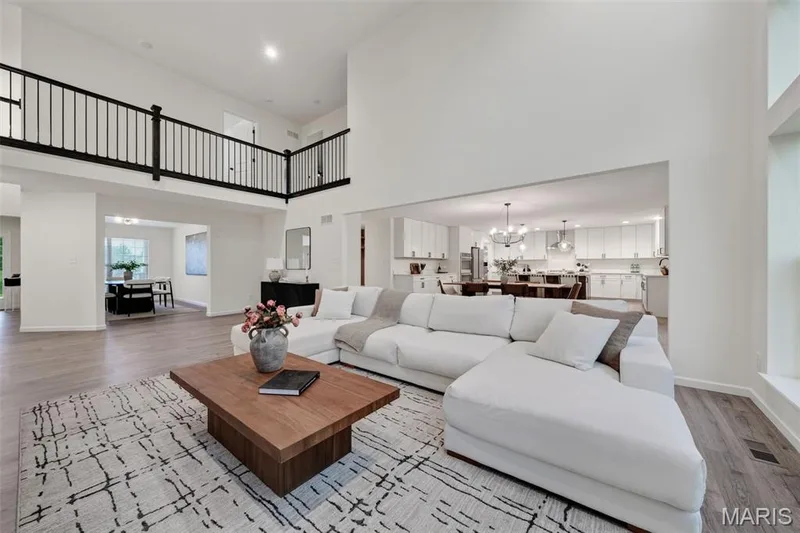 Elevated view of the upper level hallway leading to the bedrooms — 310 Osprey Court, Lake St. Louis, MO 63367