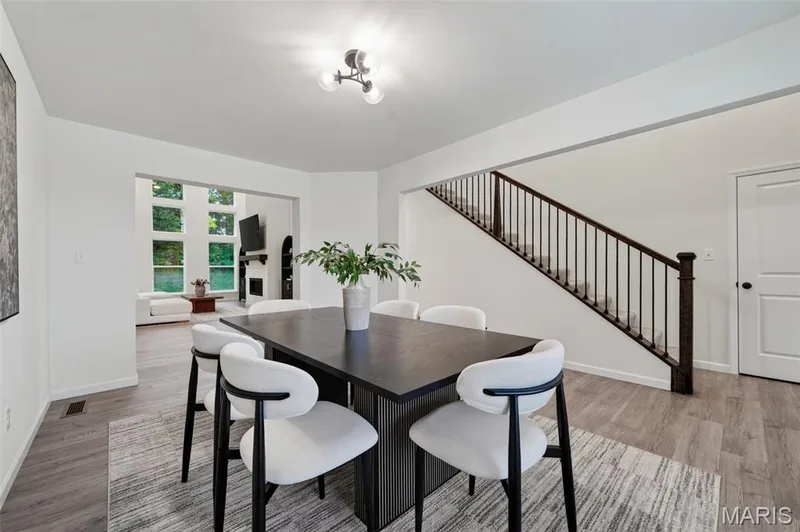 Warm wood mixed with aged metal works with any modern, farmhouse, or classic decor — 310 Osprey Court, Lake St. Louis, MO 63367